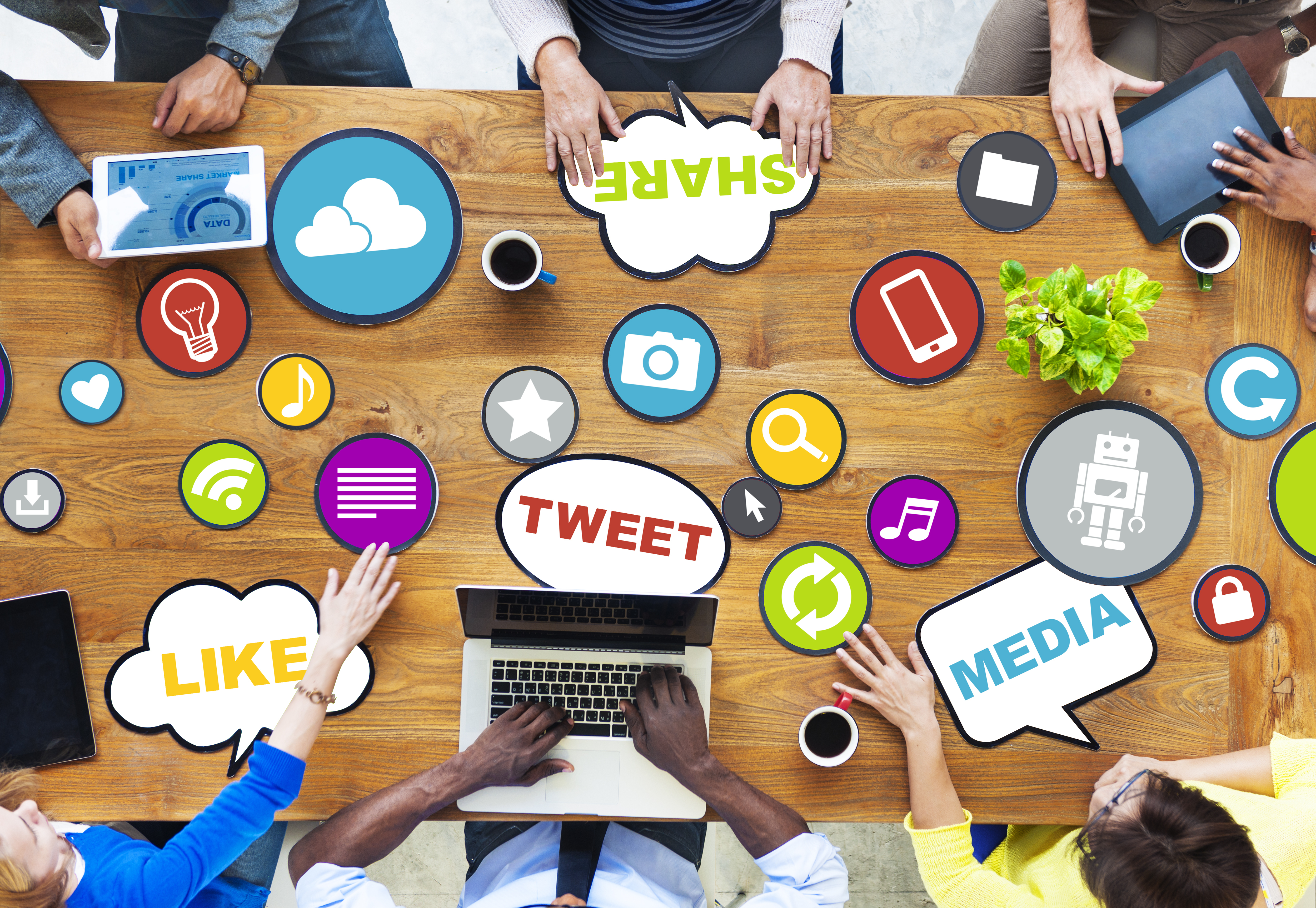 social media icons jumbled on a table